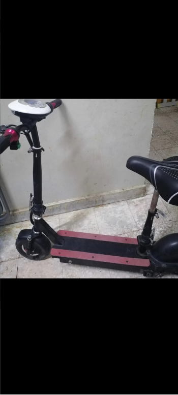 الحق ما تلحق سكوتر كهرباء مع شاحن بكرسي ب بطاريتين مع مفتاح مع شاحن