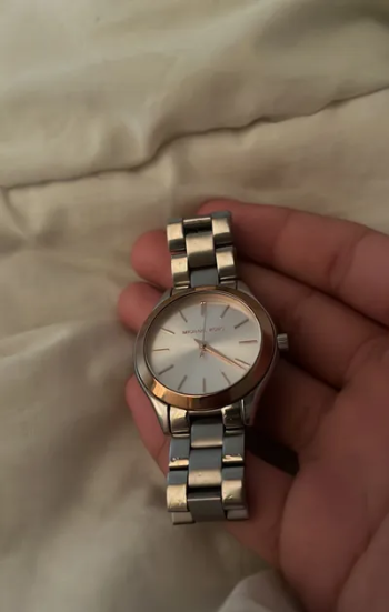 Micheal Kors watch for women Gold and silver CASH ONLY.