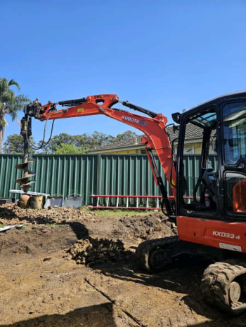 Excavator with operator